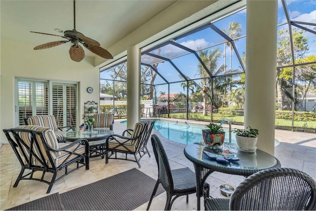 view of patio / terrace with a lanai and ceiling fan