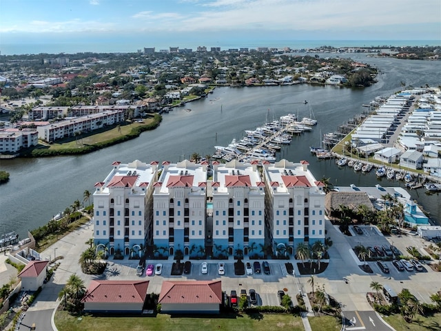 birds eye view of property featuring a water view