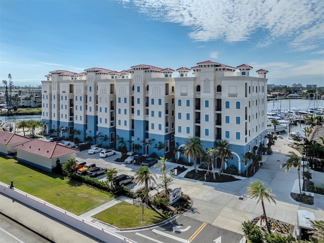 view of building exterior with a water view