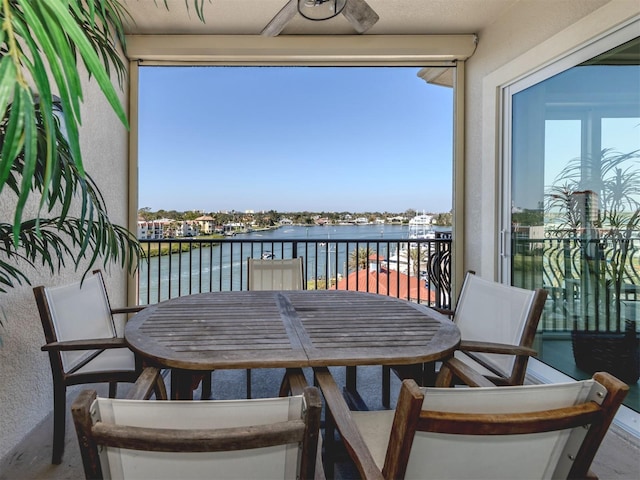501 Tamiami Trl N Unit 502, Venice, FL 34285 - balcony featuring a water view and ceiling fan
