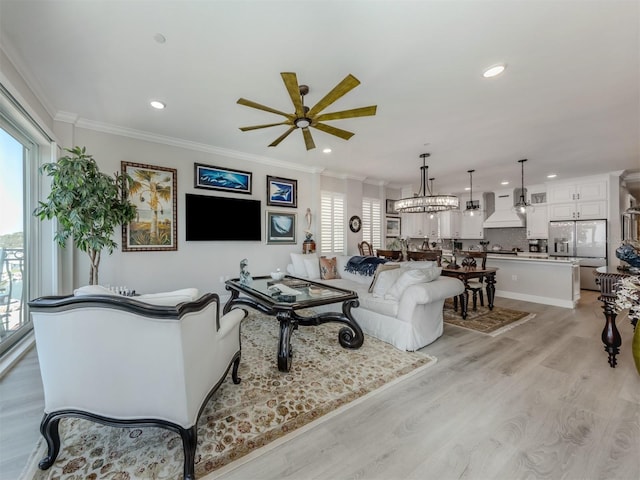501 Tamiami Trl N Unit 502, Venice, FL 34285 - living room with ornamental molding, light wood-type flooring, and recessed lighting