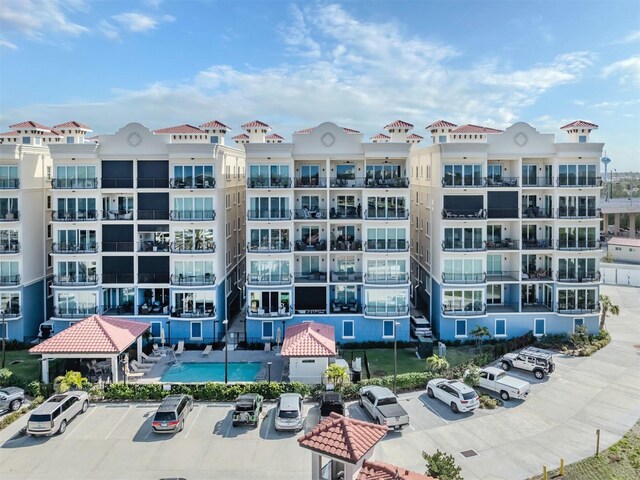501 Tamiami Trl N Unit 502, Venice, FL 34285 - view of building exterior featuring uncovered parking