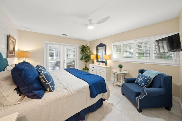 bedroom with ceiling fan, light tile patterned flooring, access to outside, and french doors