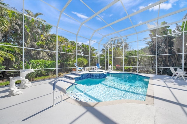 view of swimming pool featuring a patio, an in ground hot tub, and glass enclosure