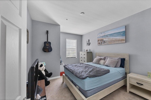 bedroom featuring carpet flooring