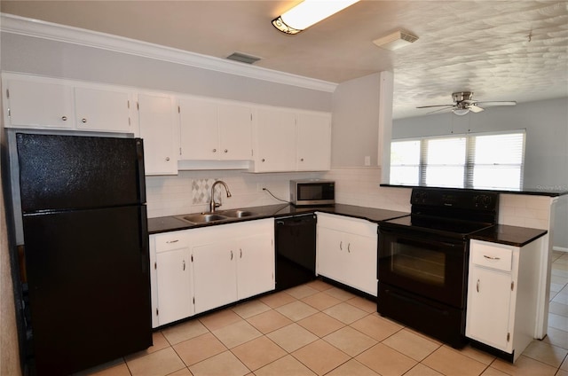 kitchen with white cabinetry, sink, decorative backsplash, and black appliances