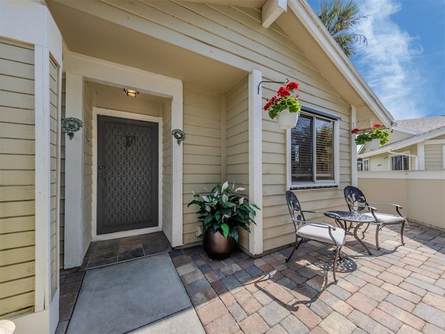 doorway to property featuring a patio