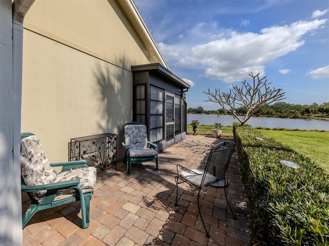 view of patio / terrace with a water view