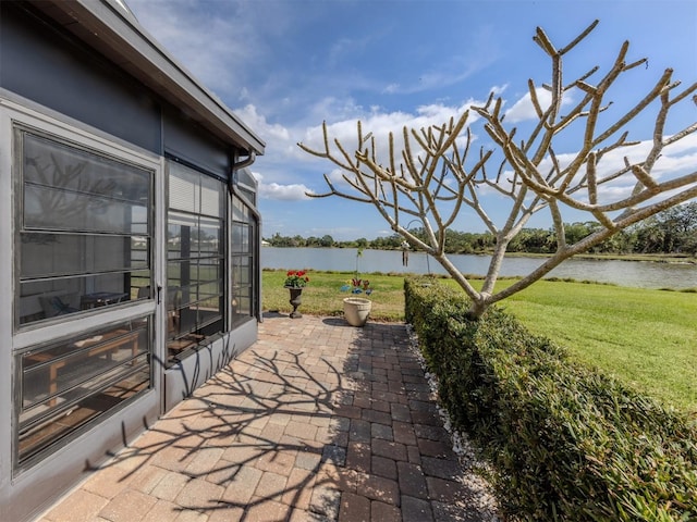 view of patio / terrace featuring a water view