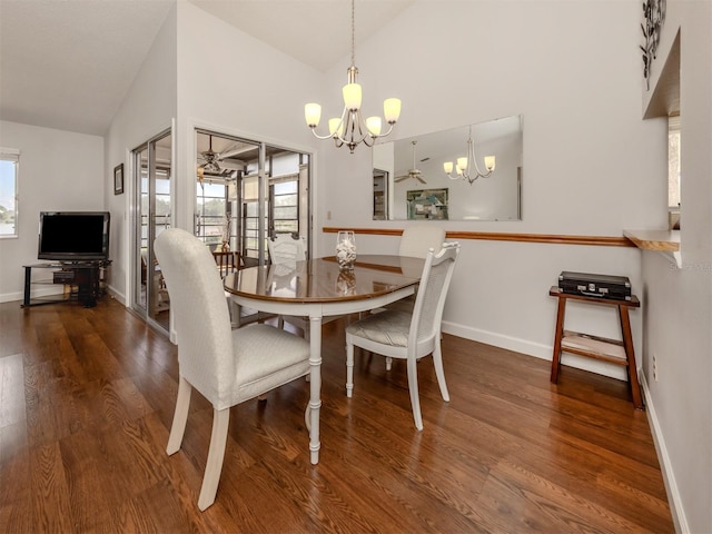 dining area featuring a notable chandelier, hardwood / wood-style floors, and high vaulted ceiling