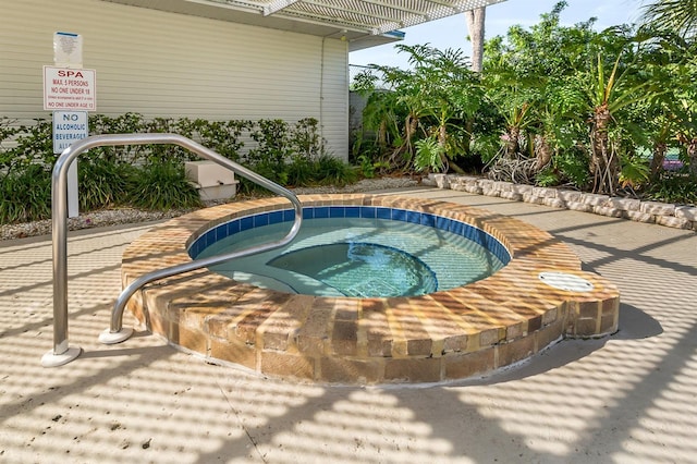 view of pool featuring a community hot tub