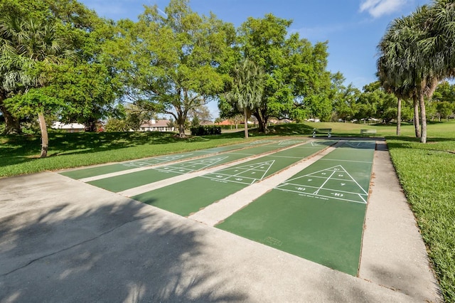 view of community featuring a lawn