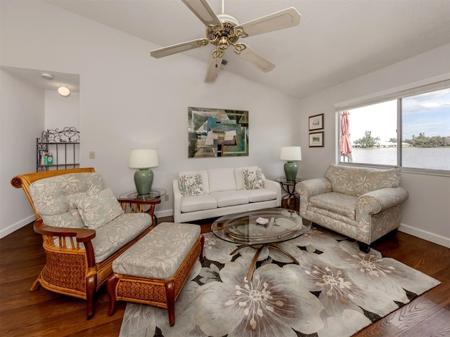 living room featuring lofted ceiling, hardwood / wood-style floors, and ceiling fan