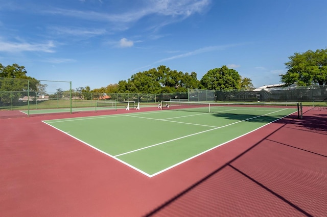 view of tennis court with basketball court