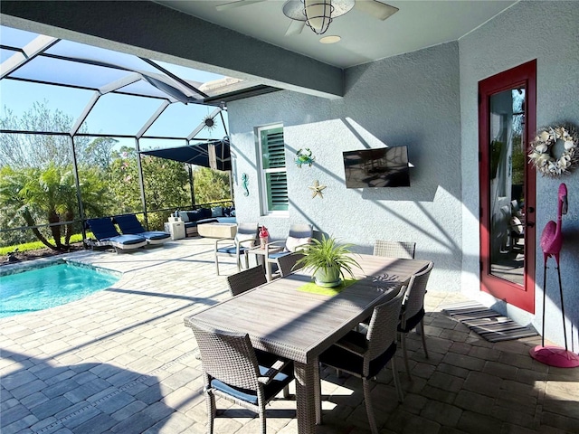 view of patio with a lanai