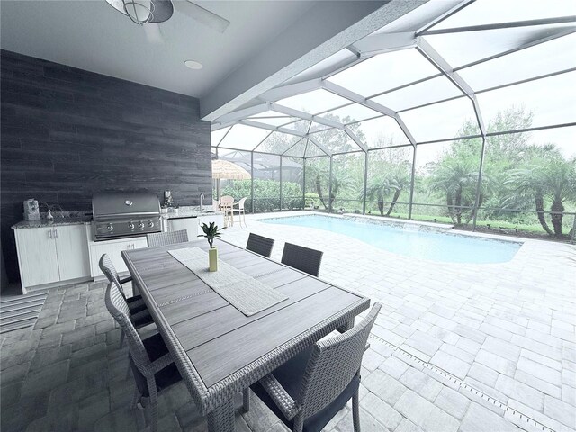 outdoor pool featuring a lanai, a patio area, area for grilling, a grill, and a ceiling fan