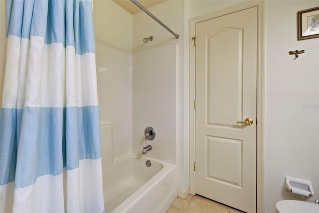 bathroom featuring shower / tub combo with curtain and tile patterned floors