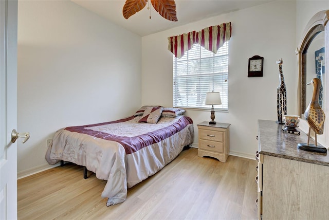 bedroom with light hardwood / wood-style flooring