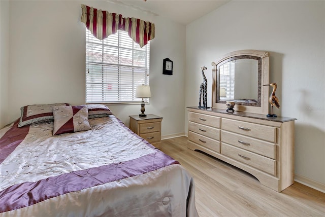 bedroom featuring light hardwood / wood-style flooring