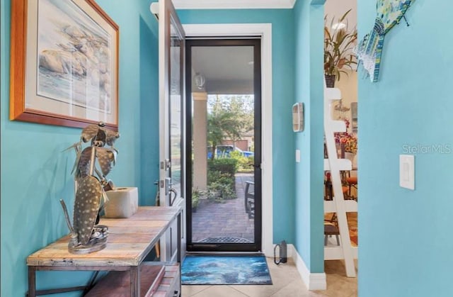 entryway featuring light tile patterned flooring