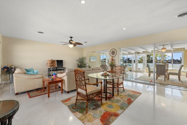 dining space with ceiling fan