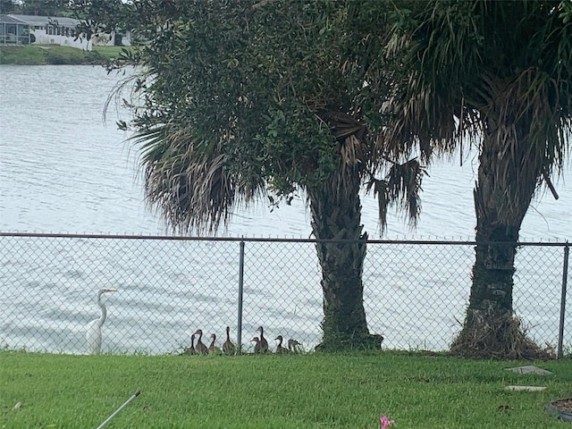 424 Shade Ter, Venice, FL 34293 - view of yard with fence and a water view