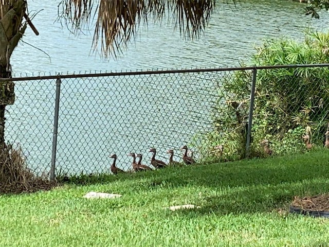 424 Shade Ter, Venice, FL 34293 - view of yard featuring a water view and fence