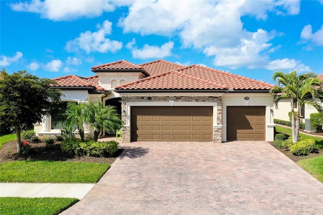 mediterranean / spanish-style house featuring a garage