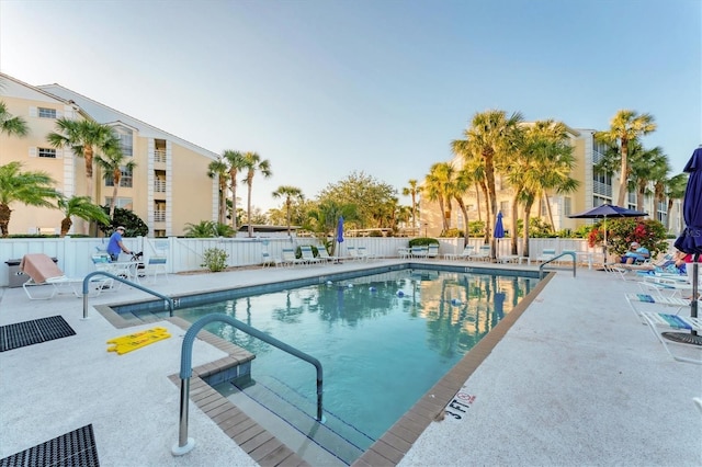 view of swimming pool featuring a patio