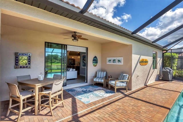 exterior space featuring ceiling fan