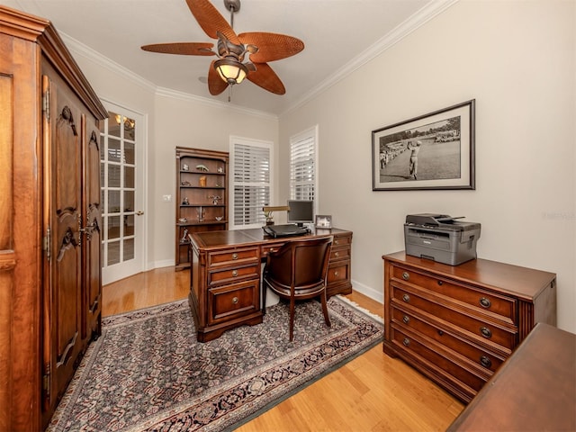 home office featuring crown molding, ceiling fan, and light hardwood / wood-style floors