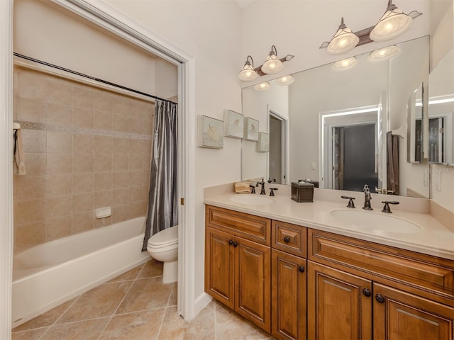 full bathroom featuring shower / bath combination with curtain, tile patterned floors, toilet, and vanity