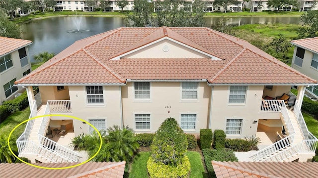 bird's eye view with a water view