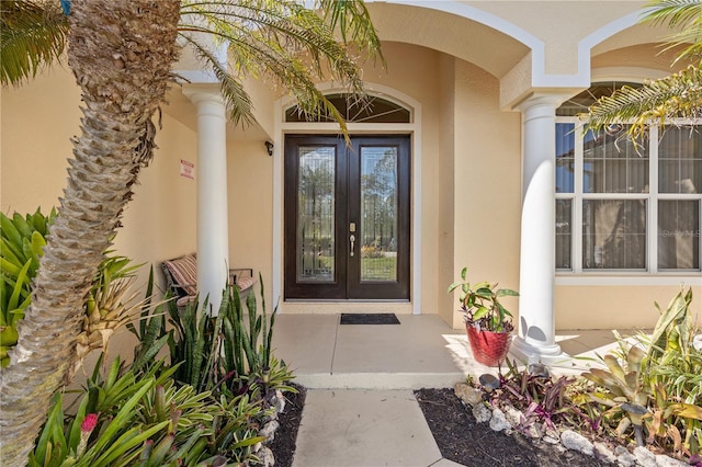 doorway to property featuring french doors