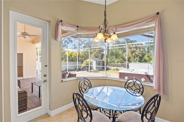 tiled dining area featuring ceiling fan