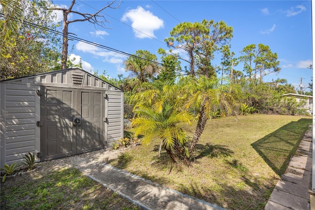 view of outdoor structure with a yard