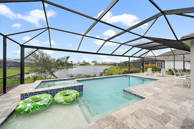 view of pool featuring a patio, a lanai, an in ground hot tub, and a water view