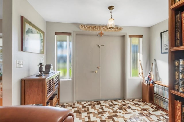 foyer featuring a wealth of natural light