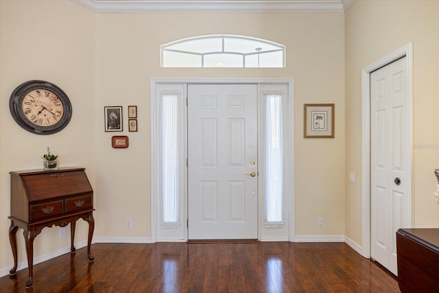 entryway with dark wood-type flooring and ornamental molding