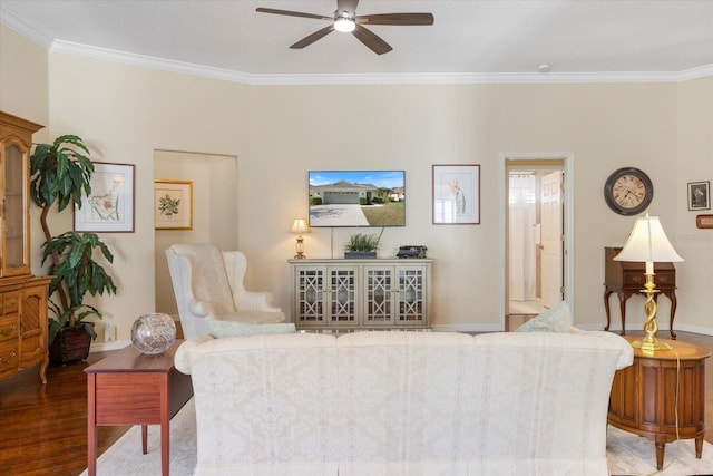 living room featuring crown molding, hardwood / wood-style floors, and ceiling fan