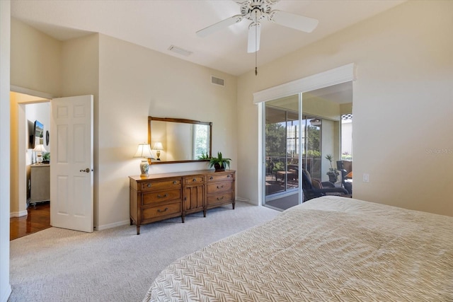 carpeted bedroom featuring access to exterior and ceiling fan