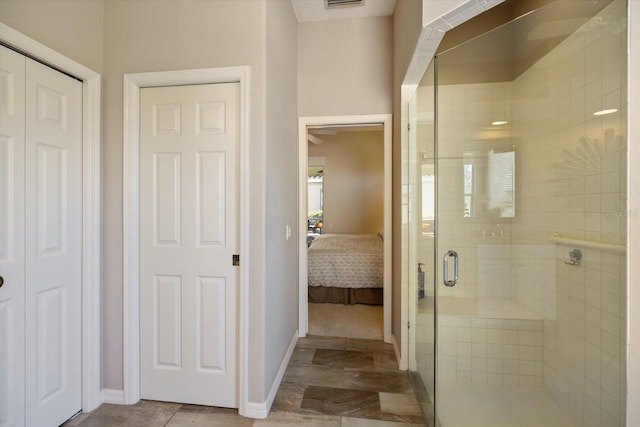 bathroom with an enclosed shower