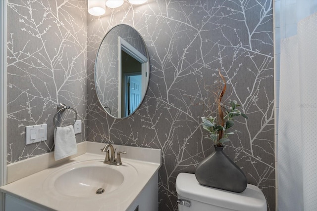 bathroom featuring sink and toilet