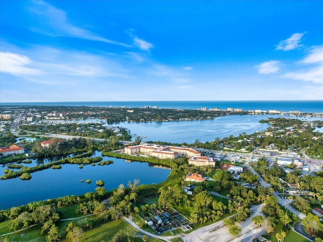 birds eye view of property featuring a water view