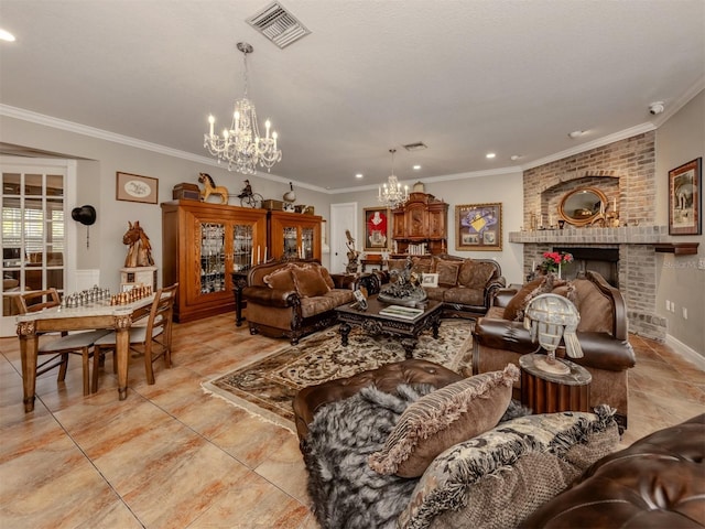 living room featuring crown molding, a fireplace, and a notable chandelier