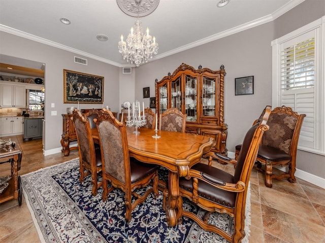 dining space with a notable chandelier, a wealth of natural light, and ornamental molding