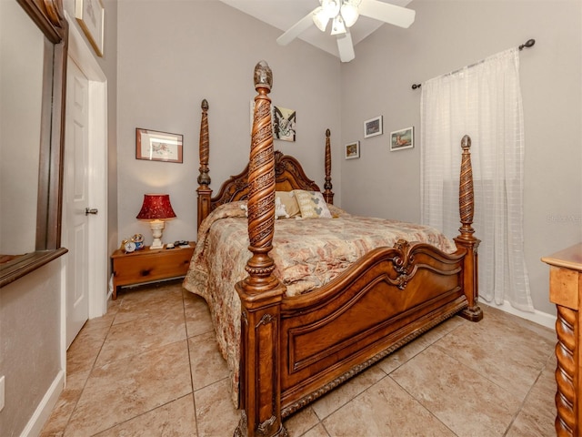 tiled bedroom with ceiling fan