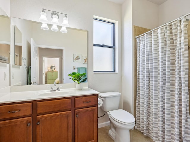 bathroom with tile patterned flooring, vanity, a shower with shower curtain, and toilet