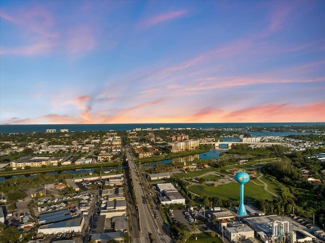 aerial view featuring a water view and a city view