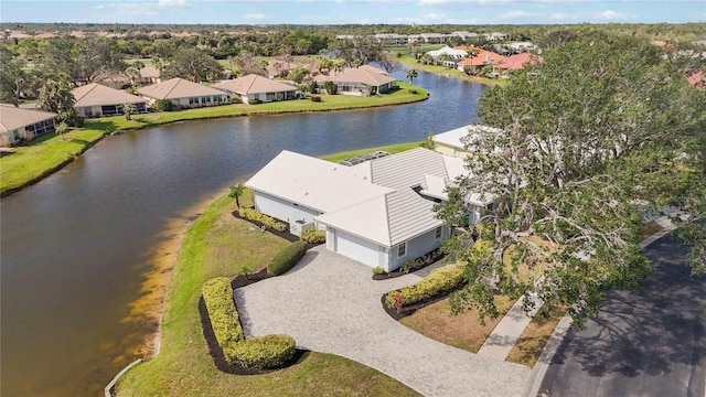 drone / aerial view with a water view